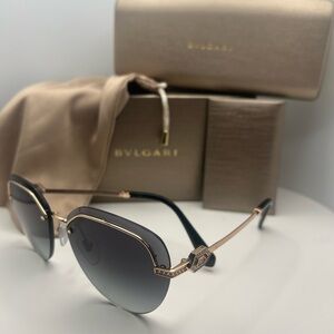 Bulgari Women's Sunglasses with Black and Gold Detailing